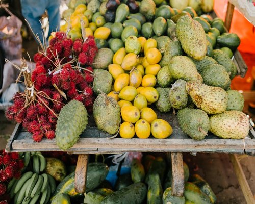 Assorted tropical fruits on a wooden table